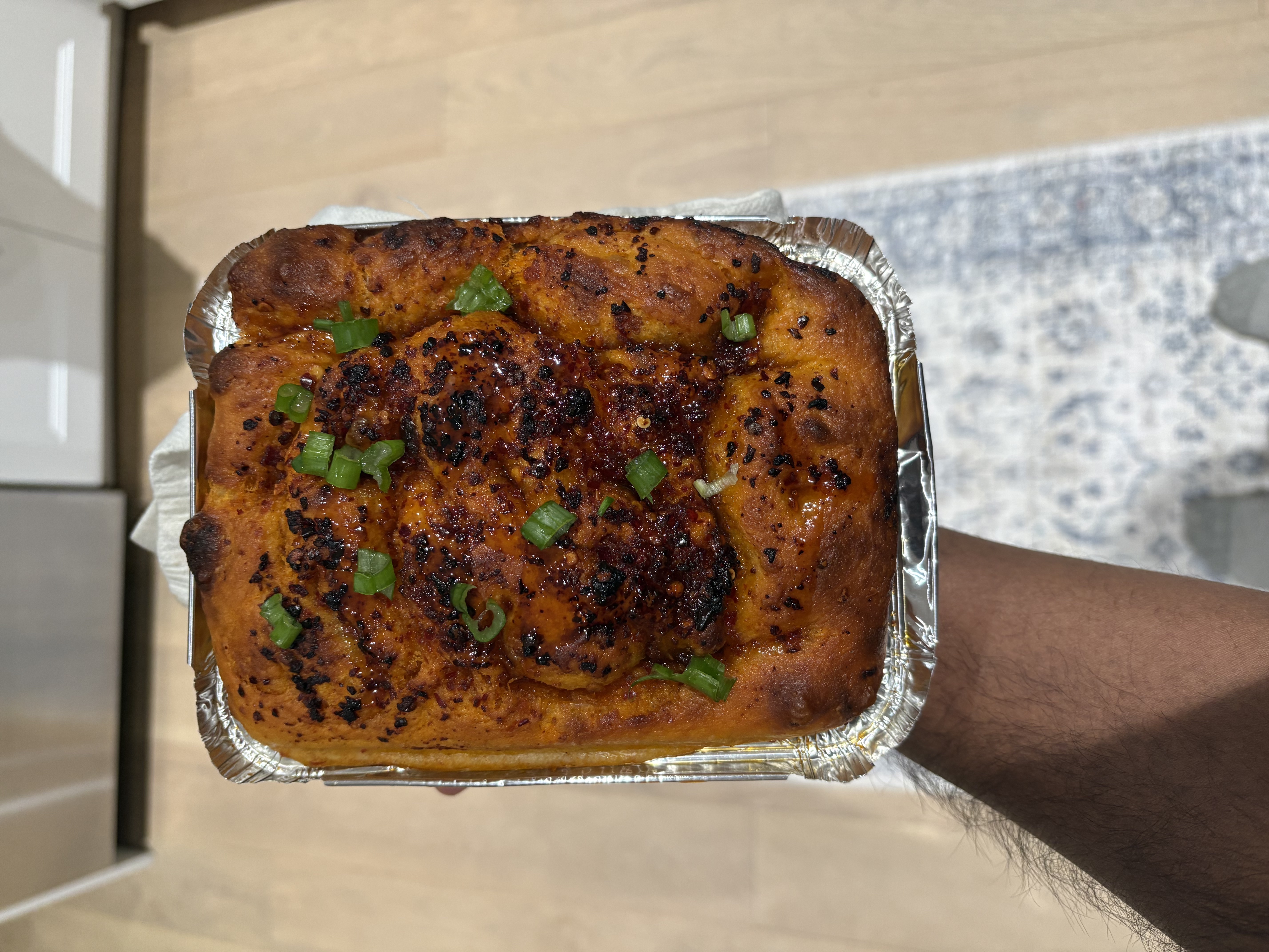 Baked focaccia topped and finished with Hot Buzz